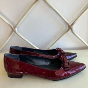 Red flat Stuart Weitzman shoes